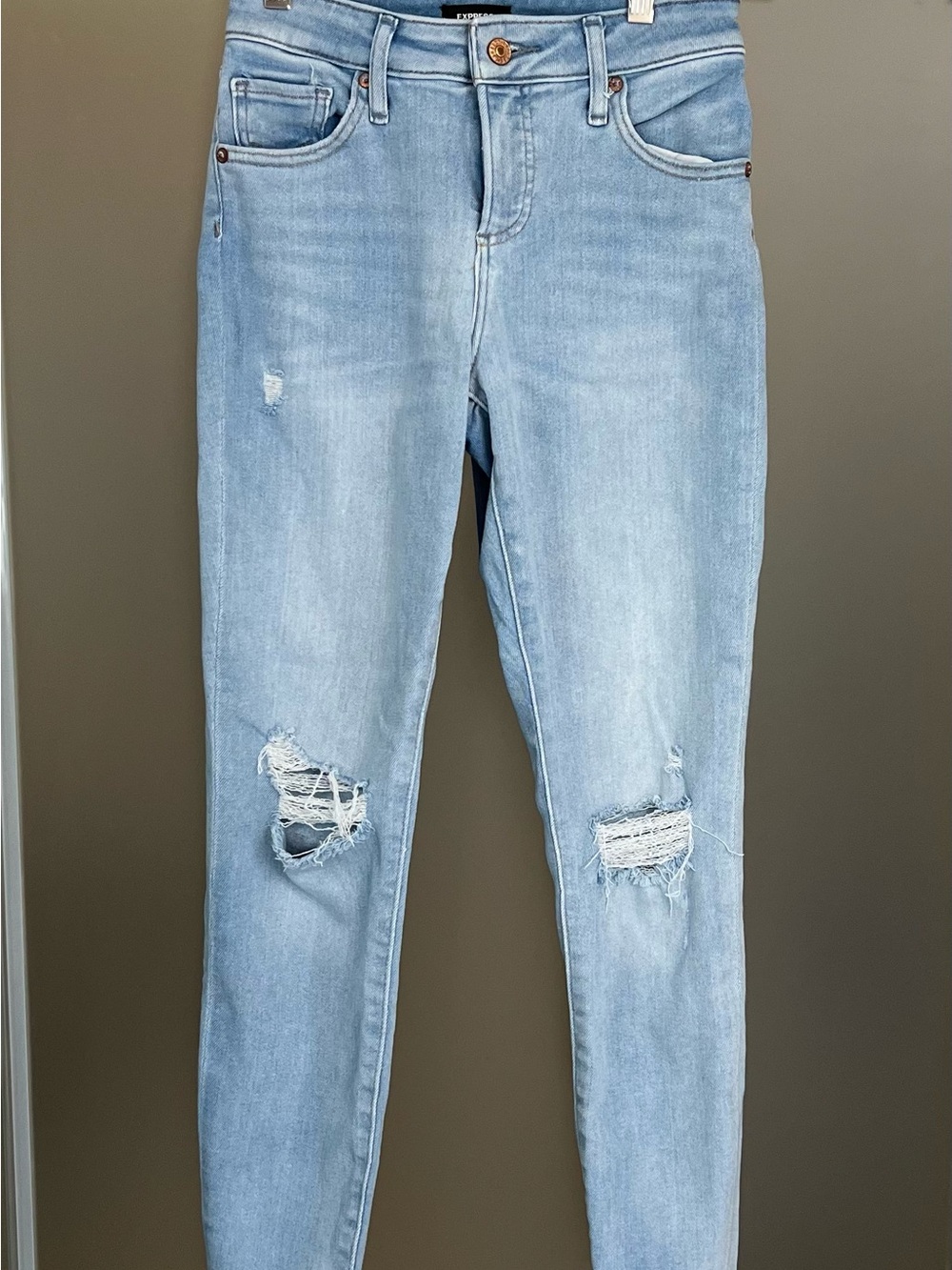 Express Light Blue Skinny Jeans with Knee Rips